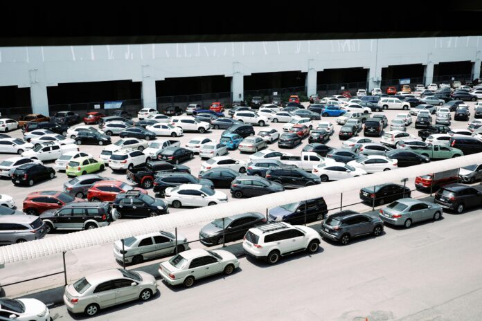 Comparison of SUVs and sedans parked side by side, highlighting differences in size, style, and features.