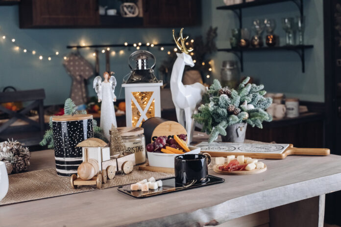 holiday decoration storage solutions, including clear bins, ornament dividers, wreath boxes, and labeled storage totes in a tidy storage area.