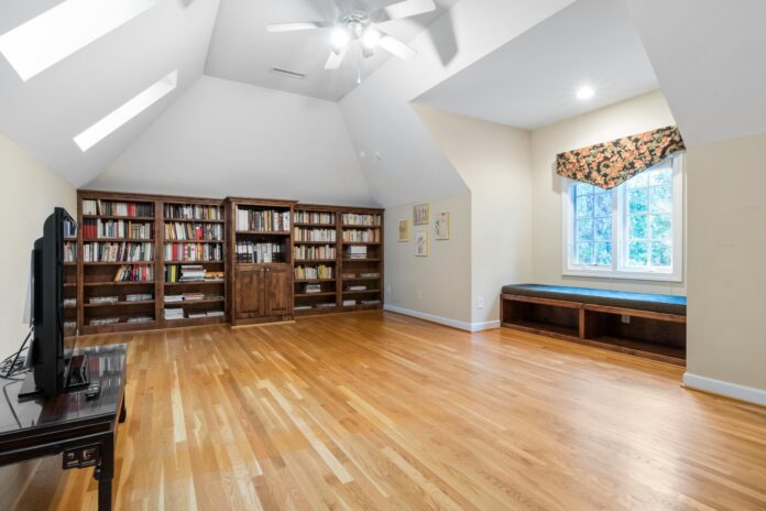 a well-organized attic with shelves, storage bins, and creative compartments for maximizing storage space.