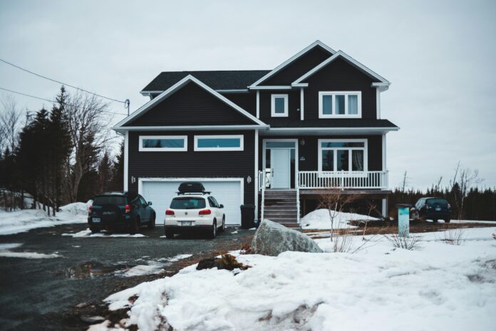 A well-insulated garage with weatherproof seals and organized storage, ready for winter.